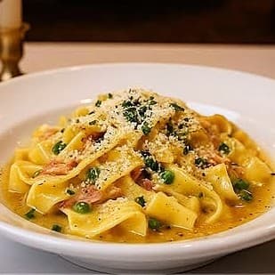 Tagliatelle carbonara with peas and parmesan